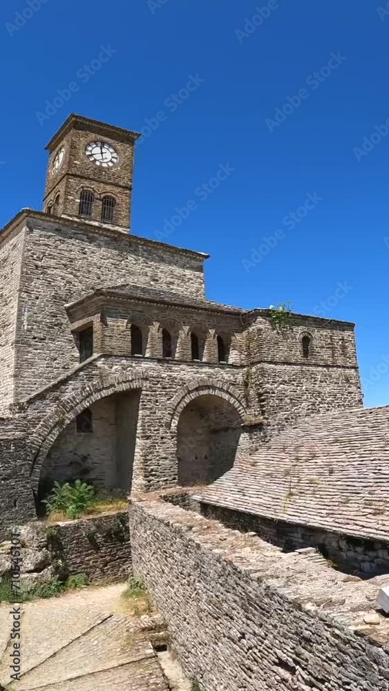 Panoramic view of the clock tower of the Ottoman castle fortress of Gjirokaster or Gjirokastra. Albania. Kulla e Sahatit Panoramic view of the clock tower of the Ottoman castle fortress of Gjirokaster or Gjirokastra. Albania. Kulla e Sahatit