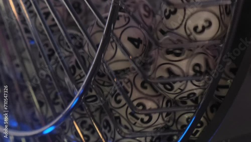 Balls with numbers rotate in a lottery machine