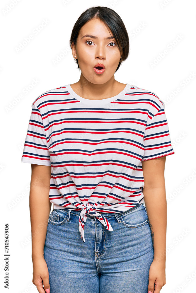 Beautiful young woman with short hair wearing casual clothes afraid and shocked with surprise expression, fear and excited face. Beautiful young woman with short hair wearing casual clothes afraid and shocked with surprise expression, fear and excited face.
