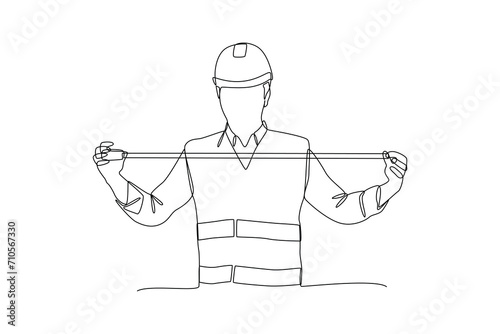 Continuous one line drawing The craftsman uses a tape measure to measure. Construction worker in uniform and helmet doing work. Builder concept. Repair work services. Single line draw design.