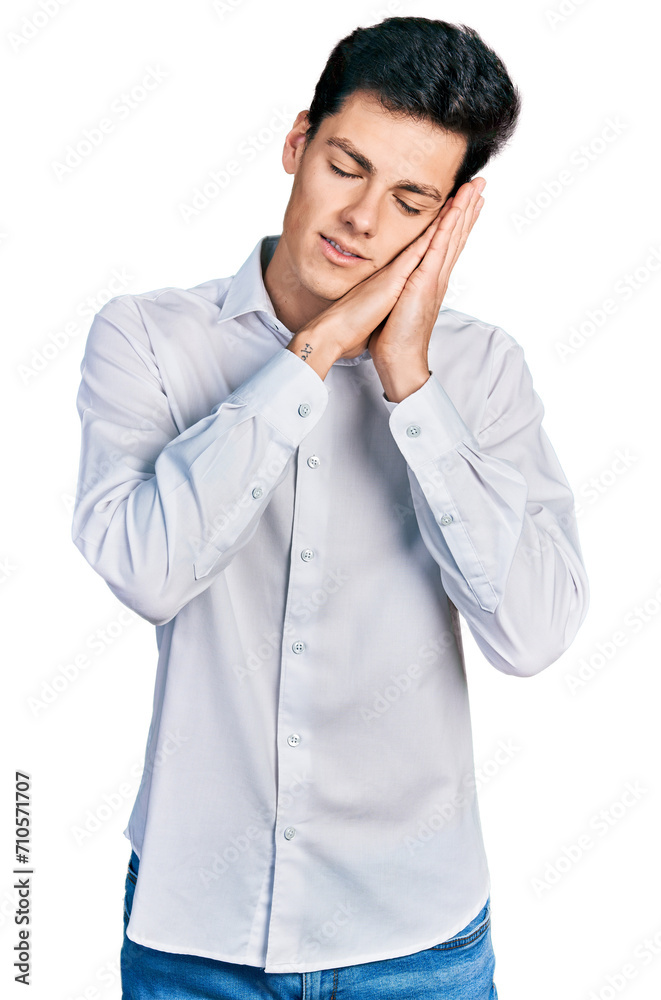 Young hispanic business man wearing business clothes sleeping tired dreaming and posing with hands together while smiling with closed eyes. Young hispanic business man wearing business clothes sleeping tired dreaming and posing with hands together while smiling with closed eyes.
