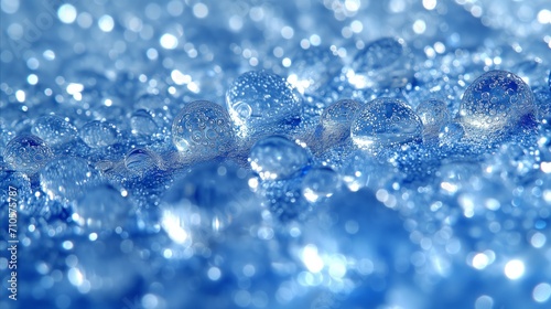 Close-up of sparkling blue bubbles with bokeh light effects