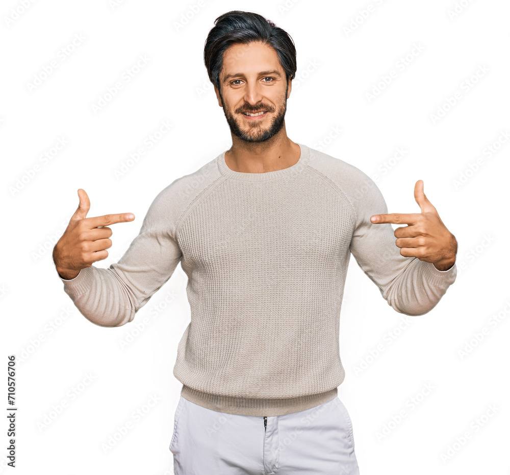 Young hispanic man wearing casual clothes looking confident with smile on face, pointing oneself with fingers proud and happy. Young hispanic man wearing casual clothes looking confident with smile on face, pointing oneself with fingers proud and happy.