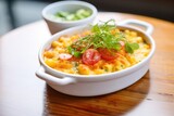 mac and cheese with diced tomatoes on top