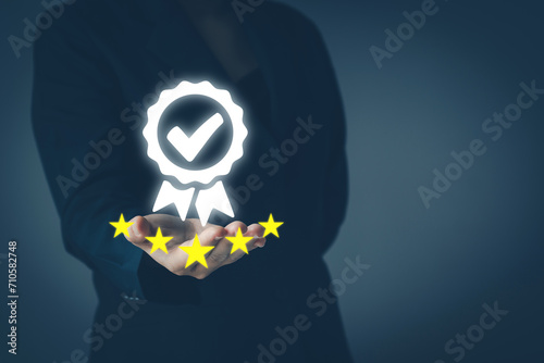 Quality assurance concepts and standards. Businesswoman showing five star high quality assurance sign, business premium service, standard Business Excellence, Accreditation ISO, good service customers