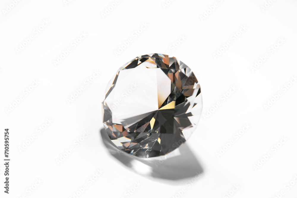 One beautiful shiny diamond on white background One beautiful shiny diamond on white background