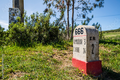 Road milestone indicating 666th kilometer on famous national road N2 going across Portugal