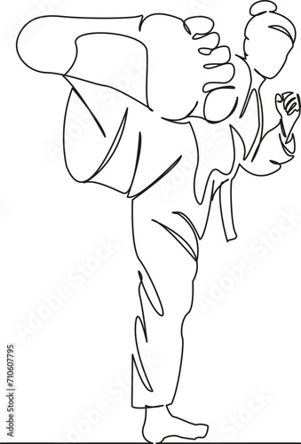 girl doing taekwondo