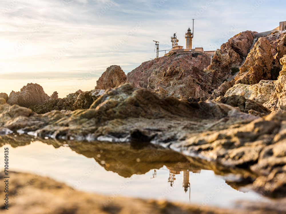 Beautiful Gata Cape landscape with rock formations in the water during sunset in Andalucia, Spain Beautiful Gata Cape landscape with rock formations in the water during sunset in Andalucia, Spain