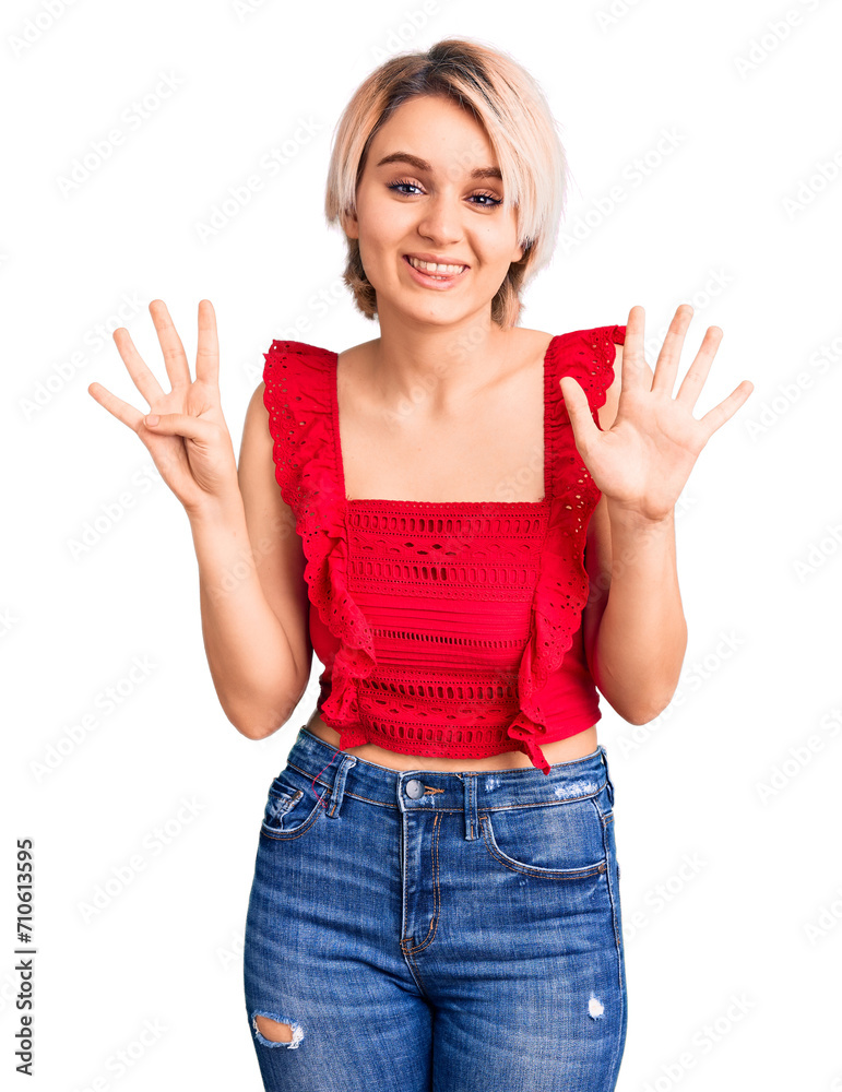Young beautiful blonde woman wearing casual clothes showing and pointing up with fingers number nine while smiling confident and happy. Young beautiful blonde woman wearing casual clothes showing and pointing up with fingers number nine while smiling confident and happy.