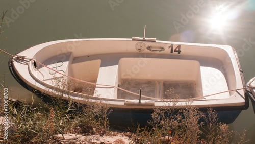 Barcas de paseo en orilla de río photo