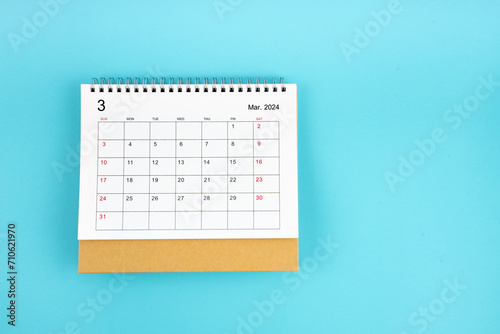 March 2024, Monthly desk calendar for 2024 year on blue background.