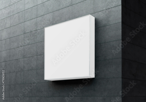 Square sign on a building wall