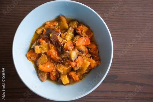 Soulful Comfort: Eggplant Stew in Blue Bowl Close-Up