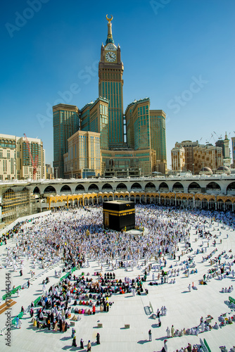 Wallpaper Mural Makkah, Saudi ARABIA-April 2018: muslim prayer and tawaf for Abraj AL Bait  prophet Muhammad, kaabah, Saufi ARABIA,macca blue sky background. Torontodigital.ca