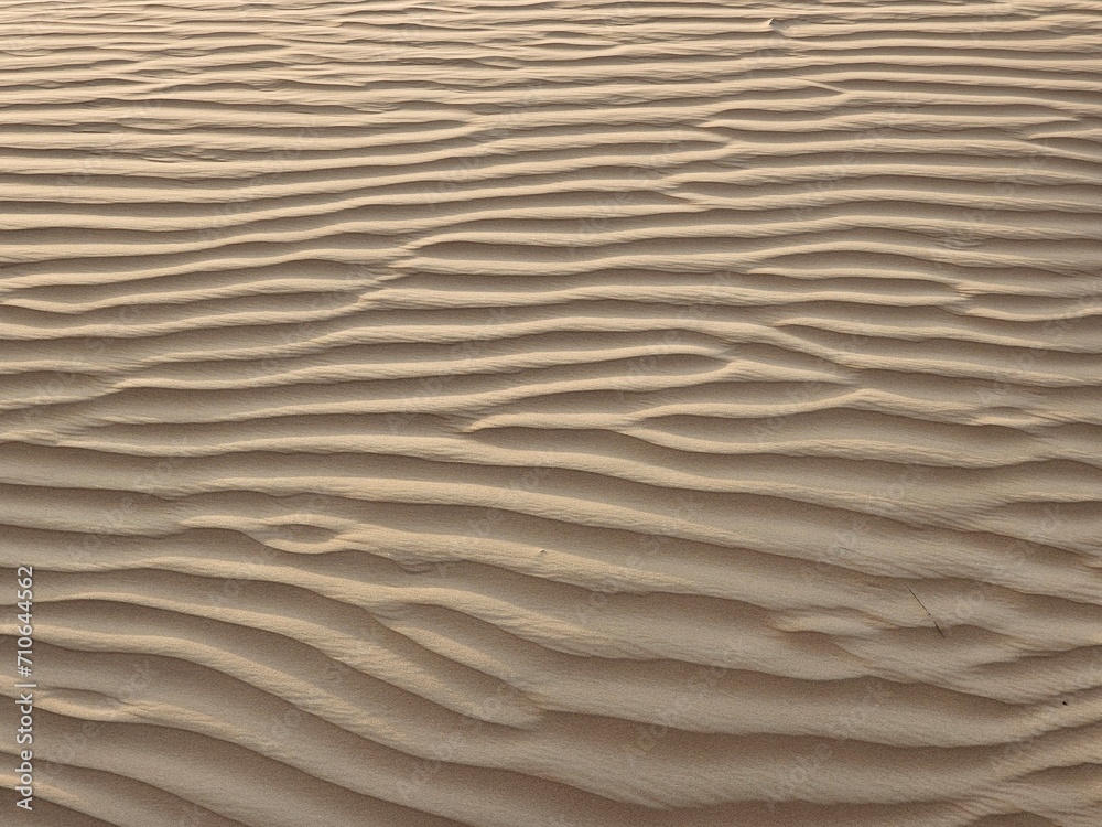 Desert sand texture with line pattern top view Spring sunset gates Sahara desert, with the sand dunes illuminated golden light, Africa tax image isolated Nice background display Beautiful colourful HD Desert sand texture with line pattern top view Spring sunset gates Sahara desert, with the sand dunes illuminated golden light, Africa tax image isolated Nice background display Beautiful colourful HD