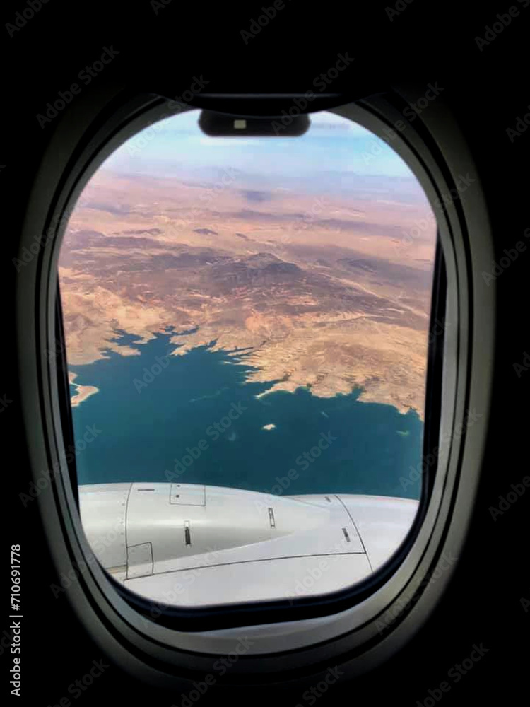 Flying over Las Vegas, view of Lake Mead through the plane window