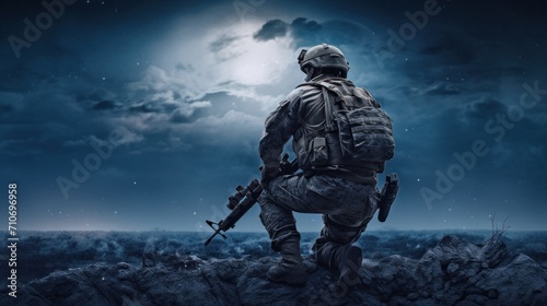 soldier against the backdrop of the full moon. Army soldier in the Mission photo