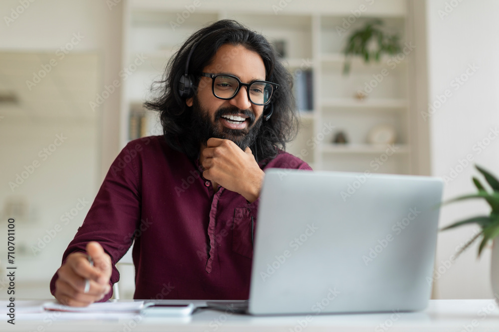 Remote Work. Smiling Indian Male Freelancer Working With Laptop At Home Remote Work. Smiling Indian Male Freelancer Working With Laptop At Home