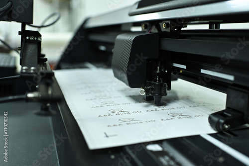 Obraz na plátně plotter cutting stickers typography polygraphy machine black labels contour cutt