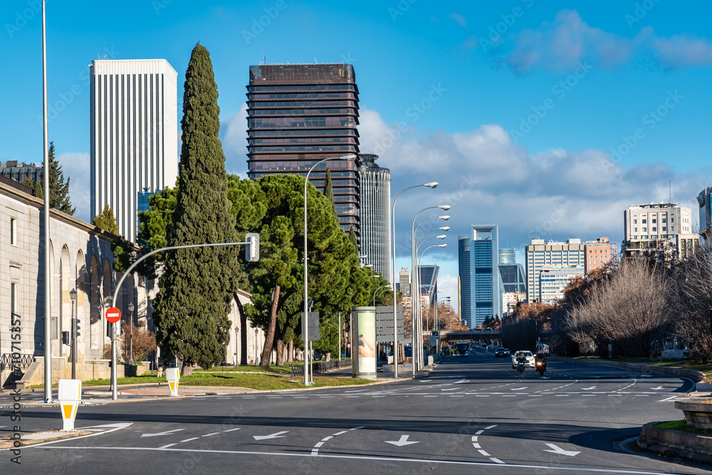 Paseo de la Castellana in Madrid with skyscrapers in the financial and economic district, Spain. Paseo de la Castellana in Madrid with skyscrapers in the financial and economic district, Spain.