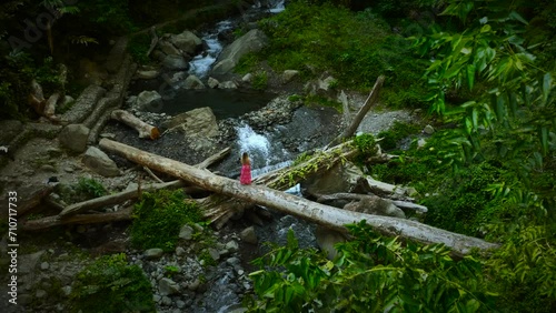 Aerial view of a person at Tiu Kelep Waterfall, Lombok, Bali, Indonesia. photo