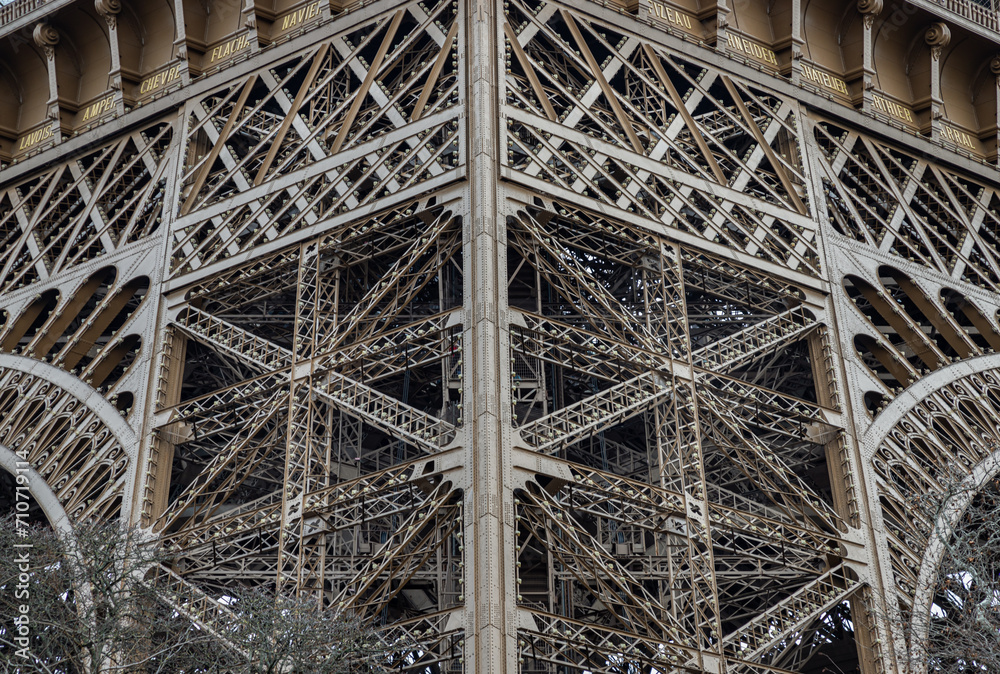 Architectural detail design of the famous Eiffel Tower iron structure. Close-up of the framework of the Eiffel Tower in Paris, France, Space for text, Selective focus.