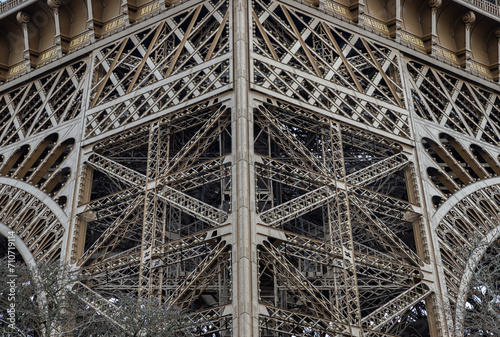 Architectural detail design of the famous Eiffel Tower iron structure. Close-up of the framework of the Eiffel Tower in Paris, France, Space for text, Selective focus.