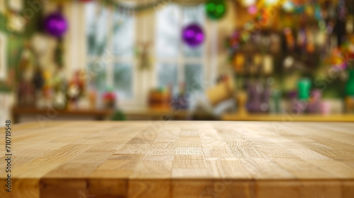 empty wooden oak beige table top and blur of room on a blur mardi gras day decoration background. photo