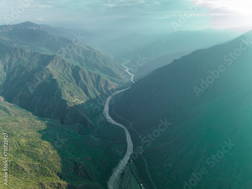 Aerial view of Rio Umpala, a river crossing the canyon across the mountain range in Jordan, Santander, Colombia. photo