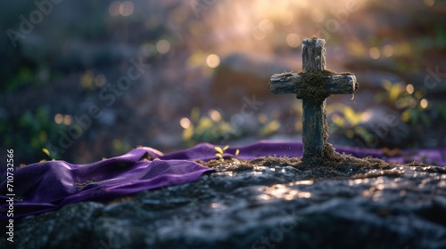 Ash Wednesday concept with a cross of ashes on a stone surface, purple cloth in the background, solemn and meditative mood, natural light. photo