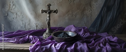 Ash Wednesday Still Life with Crucifix and Ashes. Still life of Ash Wednesday with purple cloth, ash bowl, and a crucifix, elegant and somber composition