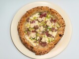 Neapolitan pizza with high edges 4 cheeses and fresh sausage top view on white plate.