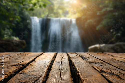 Empty Wooden Tabletop with Blurry Waterfall View Background