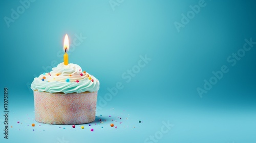 Vibrant Birthday Celebration Cake with White Drip Icing and Colorful Sugar Sprinkles on Plain Blue Background - Sweet Party Dessert for Joyous Occasions