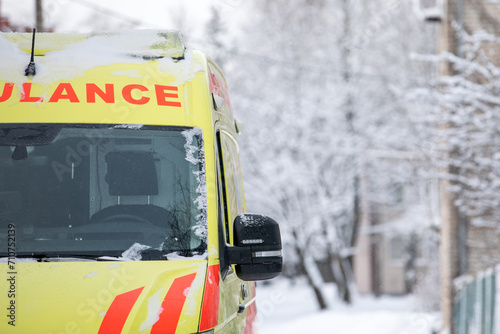 Ambulance car on snowy winter day, empty seat, close-up