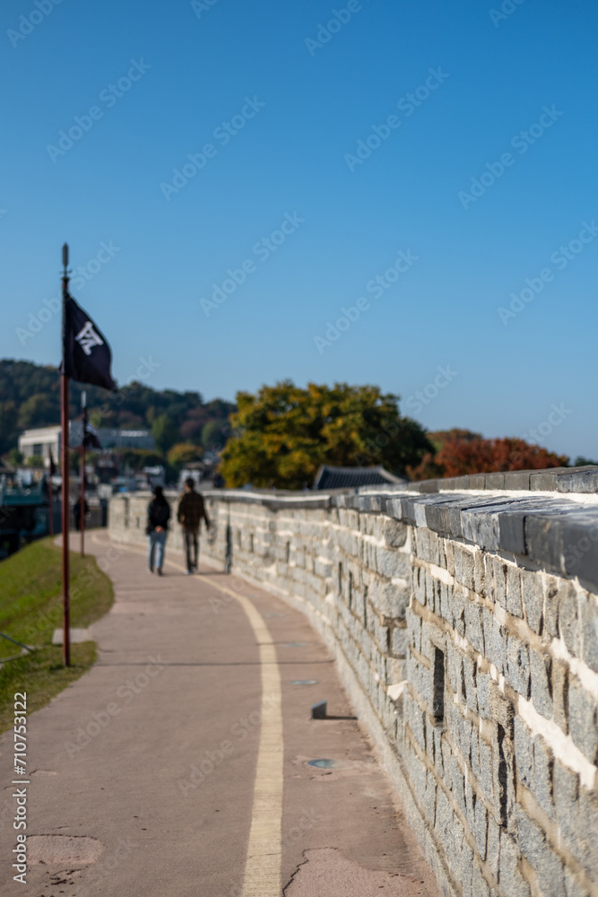 Suwon Hwaseong Fortress Wall, with the park view during autumn. The wall is surrounding the center of Suwon, the provincial capital of Gyeonggi-do, in South Korea