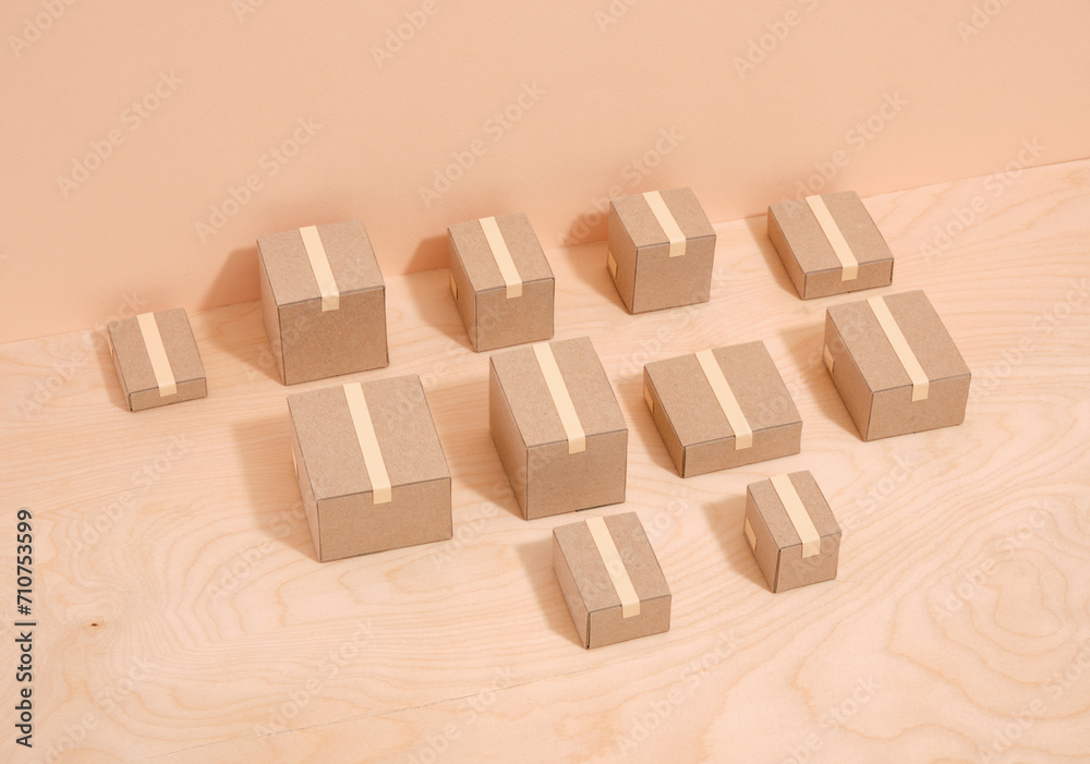 Taped cardboard boxes lie on the surface. Move and relocation. Taped cardboard boxes lie on the surface. Move and relocation.
