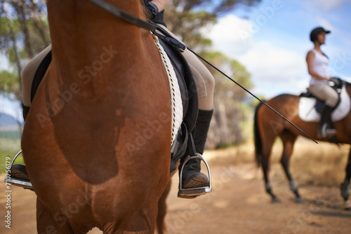 People, horses and countryside for horseback riding in texas, strong and sport training. Farm, feet and stirrup in outdoor, adventure and animal livestock with jockey, pet care and dirt road