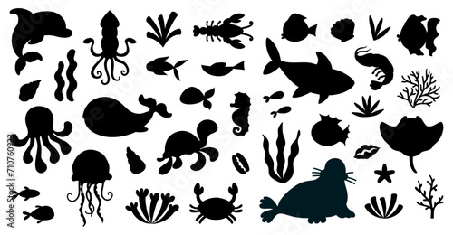 Set of black silhouette isolated marine animals in cartoon style. Sea life, ocean design elements for printing, poster, card. © AnaRisyet