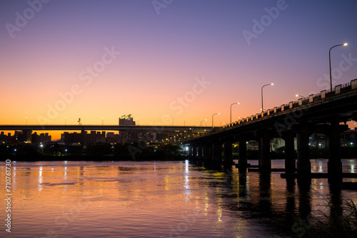 Bridge cross the river in Taipei city at sunset © leungchopan