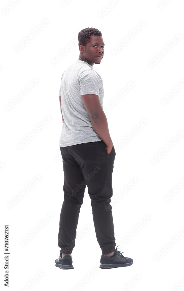 rear view. young man looking at white blank screen. rear view. young man looking at white blank screen.