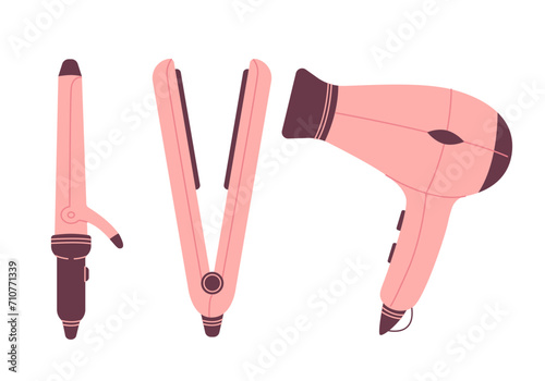 Hair styling devices set in pink color. hair dryer, hair curling, hair straightener