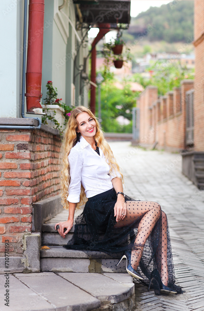 Fototapeta premium Outdoor fashion portrait of glamour sensual young stylish lady