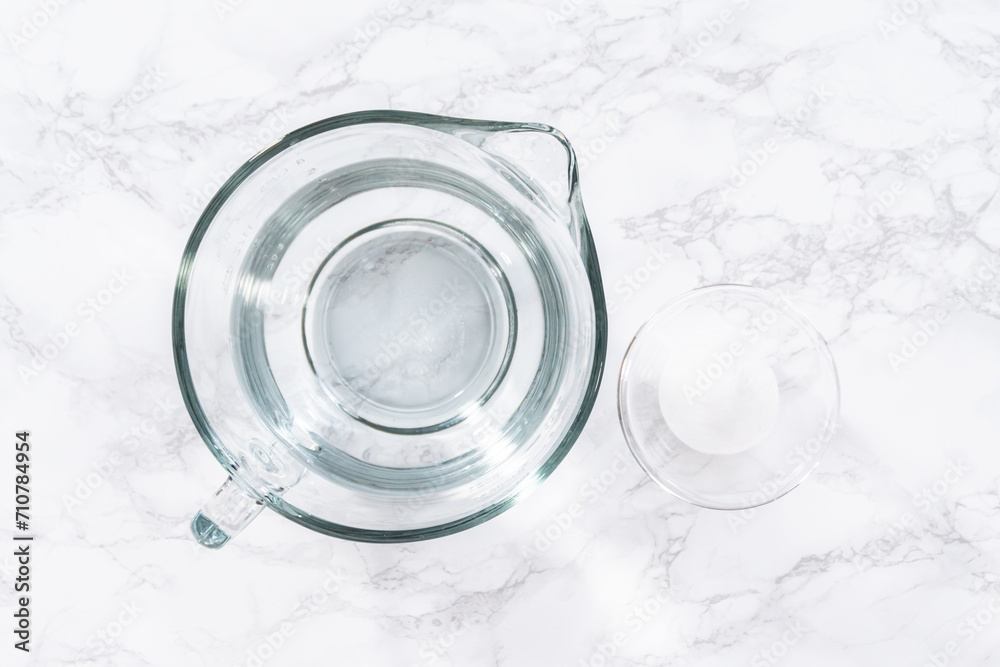 Measuring Glass Cups Filled with Water for Preparation Measuring Glass Cups Filled with Water for Preparation