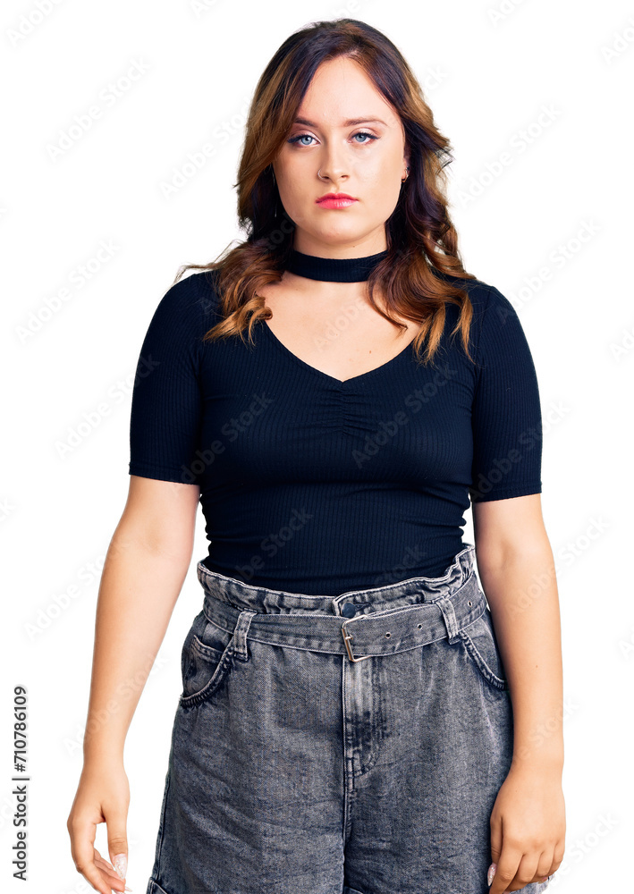 Fototapeta premium Young beautiful caucasian woman wearing casual clothes with serious expression on face. simple and natural looking at the camera.