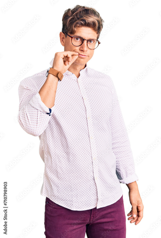 Young handsome man wearing business clothes and glasses mouth and lips shut as zip with fingers. secret and silent, taboo talking Young handsome man wearing business clothes and glasses mouth and lips shut as zip with fingers. secret and silent, taboo talking