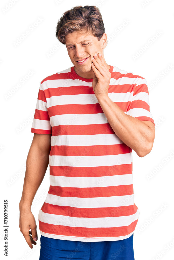 Young handsome man wearing casual clothes touching mouth with hand with painful expression because of toothache or dental illness on teeth. dentist Young handsome man wearing casual clothes touching mouth with hand with painful expression because of toothache or dental illness on teeth. dentist