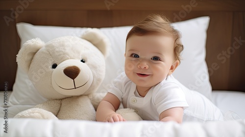 a happy baby boy dressed in a white bodysuit, embracing a teddy bear while lying in a crib at home, a closeup, highlight the sweetness of the moment.