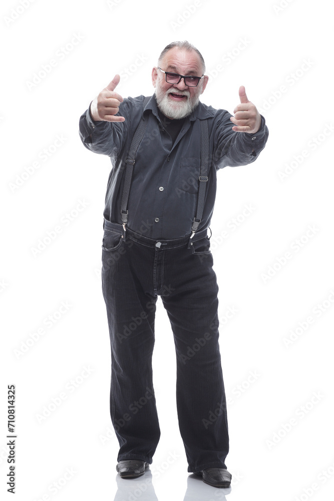 Fototapeta premium in full growth. smiling man with glasses giving a thumbs up